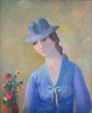 Giovane donna con cappello blu